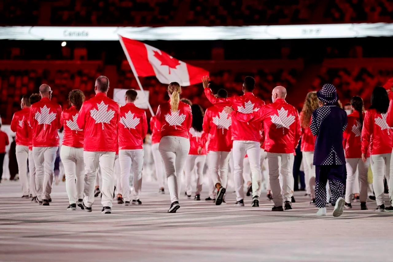 Team Canada arrives during the opening ceremony in the Olympic Stadium at the 2020 Summer Olympics, Friday, July 23, 2021, in Tokyo, Japan.