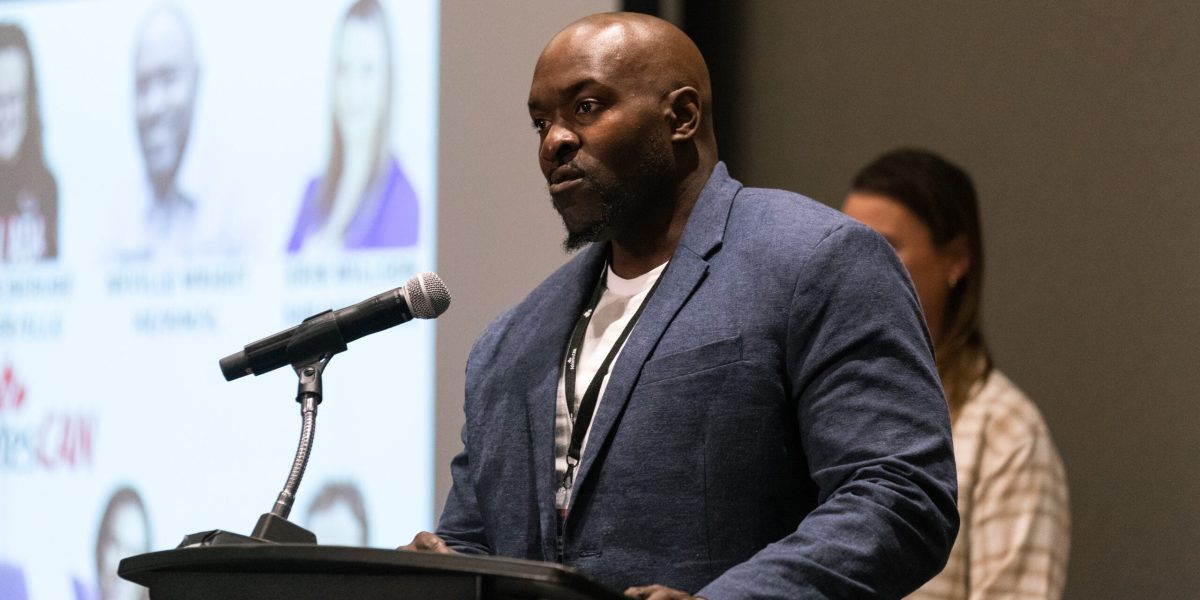 Neville Wright addresses AthletesCAN Forum 2023 in Vancouver, BC
