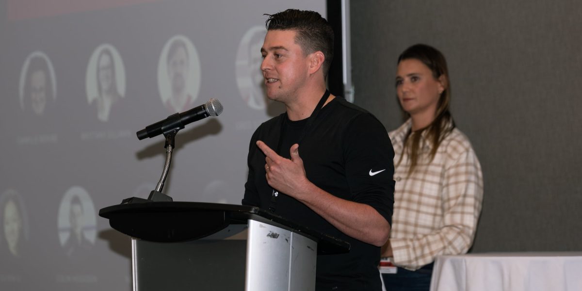 Colin Hodgson gives the Land Acknowledgement to open AthletesCAN Forum 2023 in Vancouver, BC